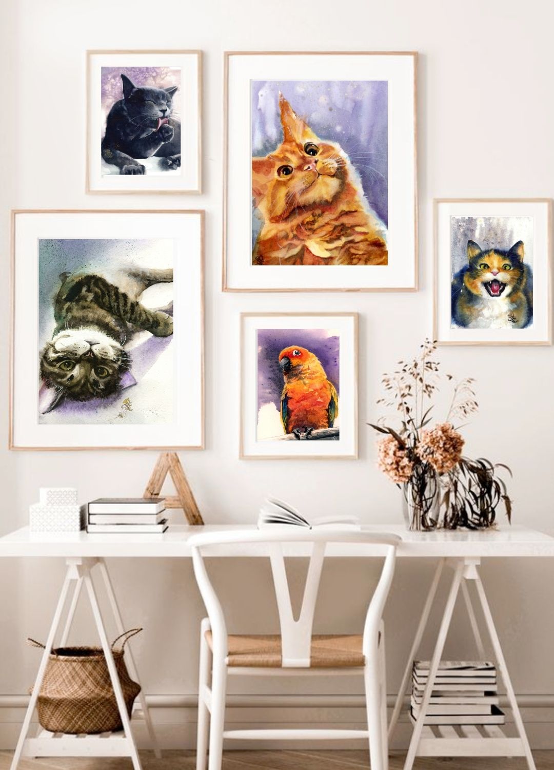 Wall with framed artworks of cats and a parrot, with a white desk below. Watercolor painting by Sophie Xie Dream In Watercolor. This stunning painting is available as a print on my website, http://www.dreaminwatercolor.com