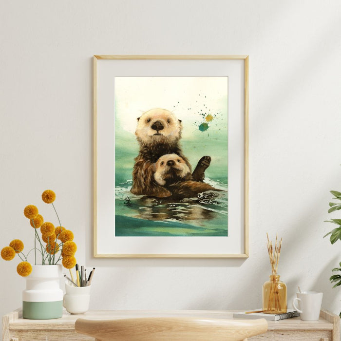 The artwork titled "Sea Otters: Mom and Me" features a cozy painting of a mother and baby sea otter floating in the turquoise sea. Watercolor painting by Sophie Xie Dream In Watercolor. This stunning painting is available as a print on my website, http://www.dreaminwatercolor.com