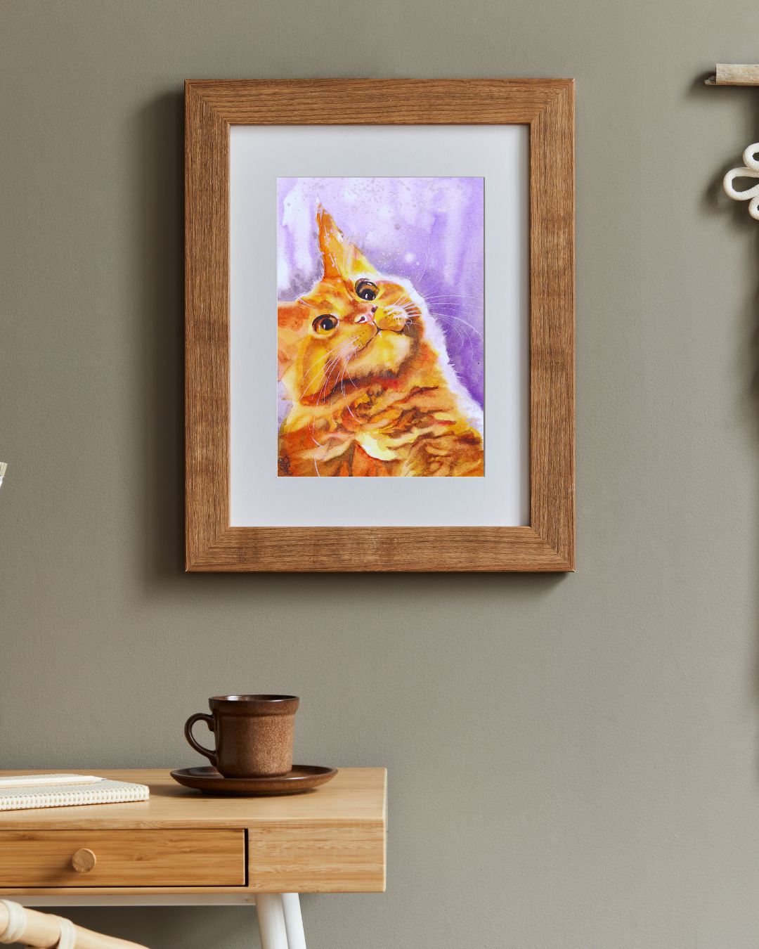 The "Cat" painting portrays an inquisitive feline, its wide eyes sparkling with wonder as it watches delicate snowflakes drifting softly from the sky.