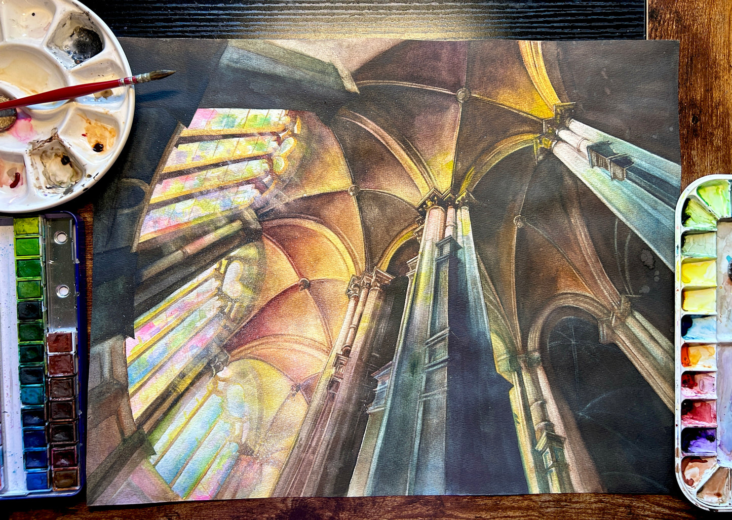 The artwork titled "Glory" captures the striking and intricate architecture of a medieval Gothic cathedral. Majestic spires and detailed stonework rise toward the sky, while vibrant light filters through the colorful stained glass windows, casting a kaleidoscope of hues across the interior. This interplay of architecture and light creates an awe-inspiring atmosphere, evoking a sense of reverence and wonder within the sacred space.