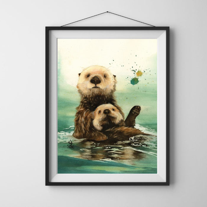 The artwork titled "Sea Otters: Mom and Me" features a cozy painting of a mother and baby sea otter floating in the turquoise sea. Watercolor painting by Sophie Xie Dream In Watercolor. This stunning painting is available as a print on my website, http://www.dreaminwatercolor.com