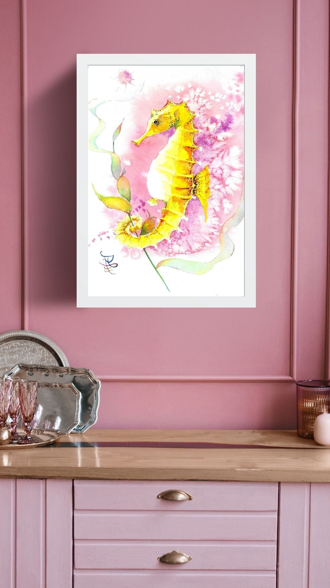 The artwork titled "Pink Octopus" vividly captures a whimsical, flamboyant seahorse, adorned with vibrant hues, as it playfully entwines itself with a flowing, ribbon-like sea plant.&nbsp;